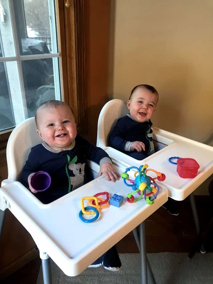 twins in high chairs